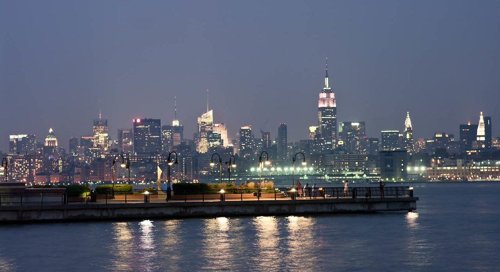The Manhattan skyline at dusk seen across the Hudson River from New Jersey